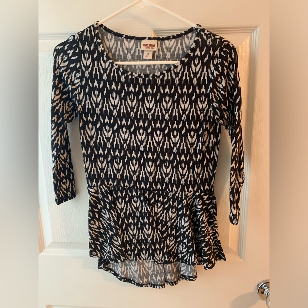 Three quarter length sleeve peplum shirt